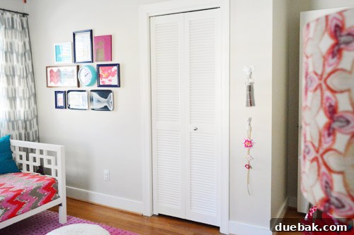 Anthropologie hooks on the wall, showing space above for future art