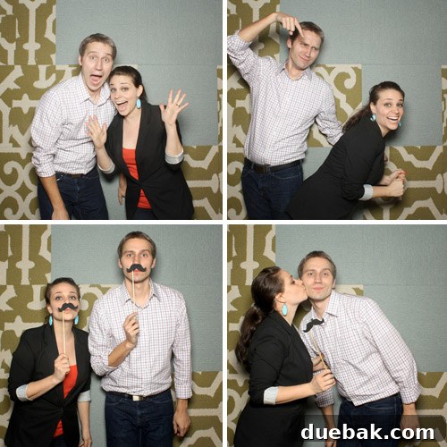 January Superlatives From Grown-Up Quarters to Power Coats 2 A person posing with a novelty mustache prop at a book signing event.