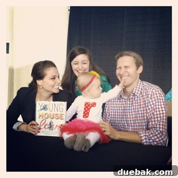 The author having his mouth playfully examined by baby Ruby, whose mother is apologetic.