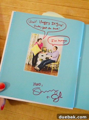 A book signed by the authors with speech bubbles added over their photos, one saying 'I'm hungry'.