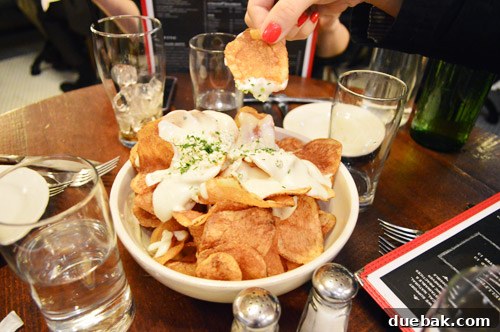 Swapping the Apple for the Peach 14 Cheese-covered potato chips served at The Smith restaurant in NYC