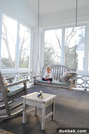 Swapping the Apple for the Peach 21 A bright and inviting sunporch with comfortable seating at Duke Mansion