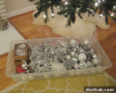Under-bed storage container for Christmas tree ornaments