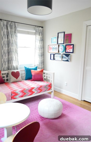 A wider view of Clara's room showing various decorative elements and furniture, including the birdcages and daybed.