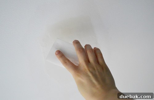 Smart Savings on Electrical Services 13 Using a Magic Eraser to smooth dry spackle on the ceiling, a low-dust alternative to sanding.