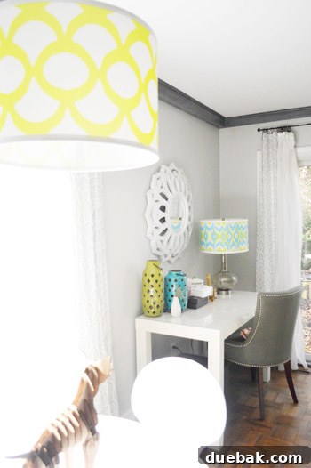 Smart Savings on Electrical Services 16 A colorful lamp shade on a stationery desk, adding a vibrant accent to the room's decor.
