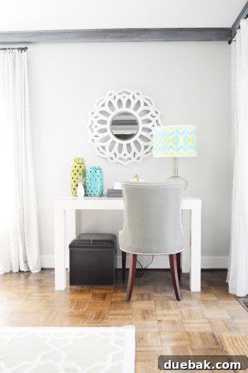 Smart Savings on Electrical Services 17 The colorful lamp shade harmonizing with other decorative elements like lanterns and a mirror.
