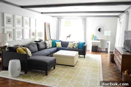 Smart Savings on Electrical Services 20 A 'current' picture of the transformed living room, highlighting the significant improvements in lighting and overall design.