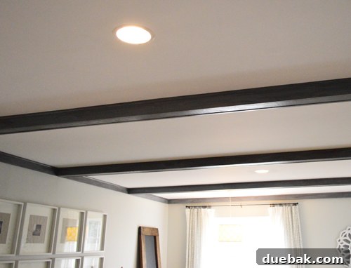 Smart Savings on Electrical Services 5 Two new recessed lights beautifully installed in a freshly painted ceiling, providing crisp, modern illumination.