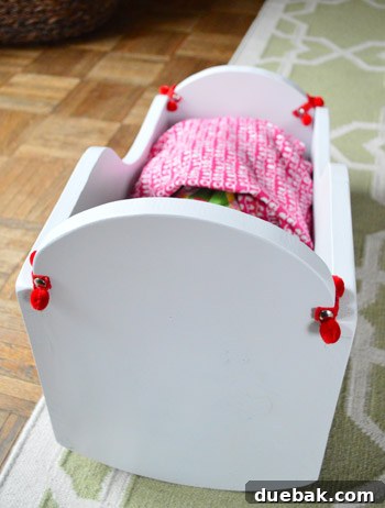 Rear view of doll cradle showing nailhead attachment