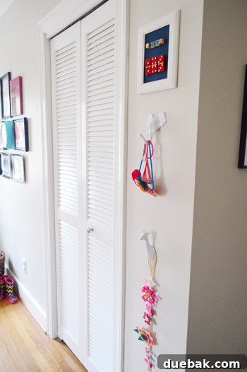 Framed 'Love' art with dominoes and scrabble letters