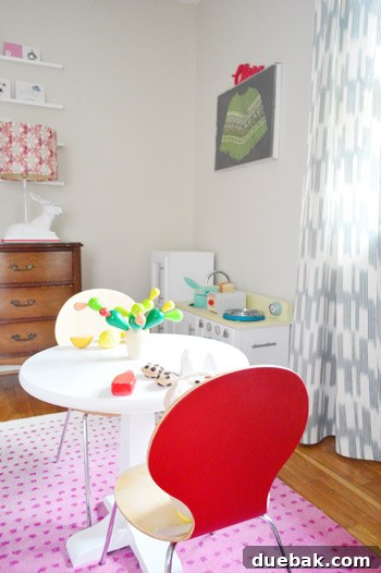 Clara's tea party table with toys