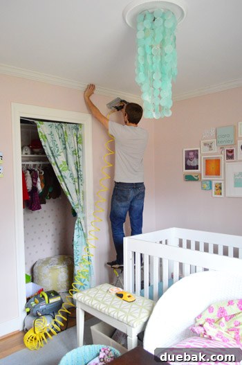 Mastering Crown Molding Installation 16 John nailing crown molding to ceiling using compressor and nail gun