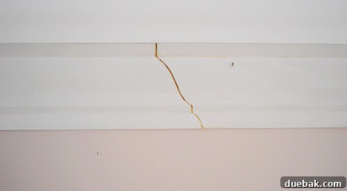 Mastering Crown Molding Installation 18 Scarf joint in crown molding where two pieces of molding overlap