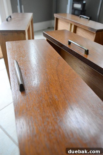Media cabinet drawer after applying Restore-A-Finish, showing improved color and shine