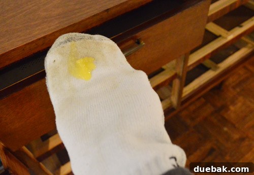 Applying Howard Feed-N-Wax with an old sock