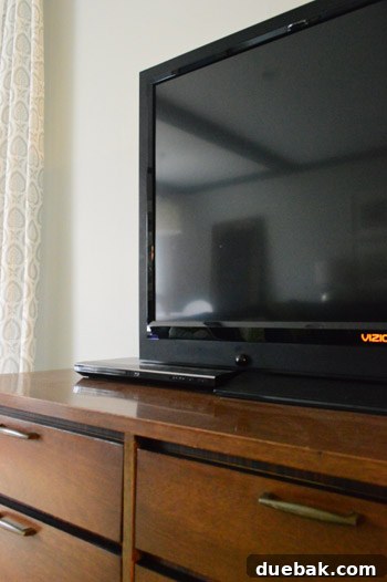 Cable box hidden inside the media cabinet drawer