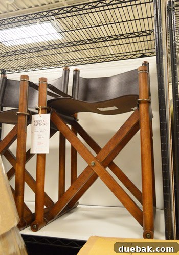 Chic leather and wood chairs with antique-style hardware