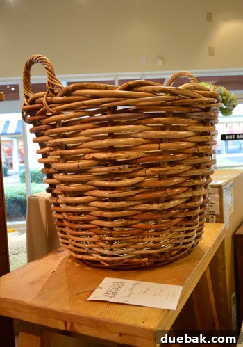 Large woven basket with chunky handles, ideal for stylish storage
