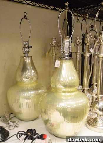 Two gleaming glass lamps with gourd-like shapes at Pottery Barn Outlet