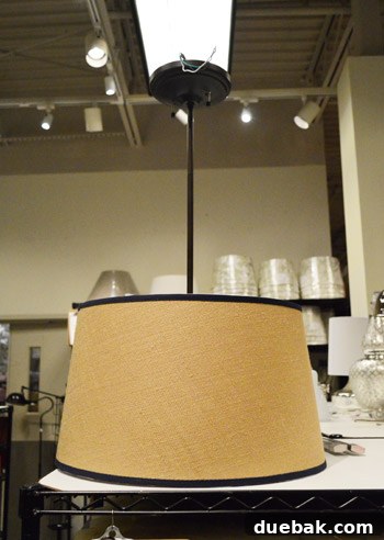 Modern pendant light fixture with a long drop-rod at Pottery Barn Outlet