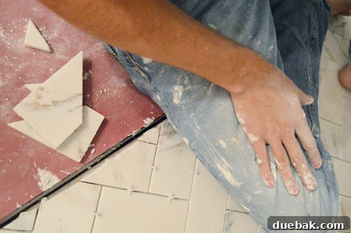 Work in progress shot of fireplace tiling