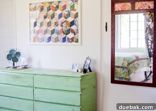 Crashing into Quaintness: The Vine-Covered Home 11 Bedroom with thrifted dresser and handmade patchwork wall art
