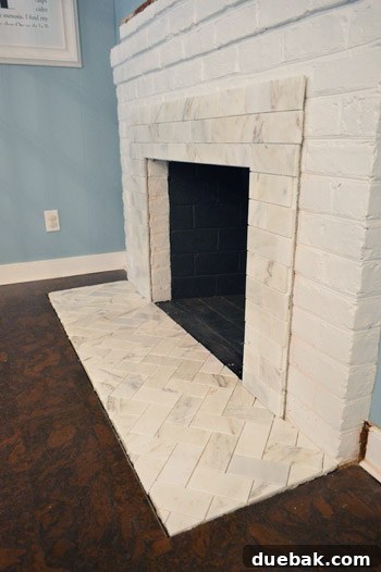 Your Guide to a Stunning Marble Herringbone Fireplace 18 All fireplace tiles installed