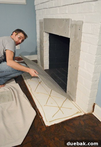Your Guide to a Stunning Marble Herringbone Fireplace 8 Securing cement board on fireplace hearth