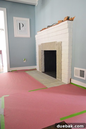 Your Guide to a Stunning Marble Herringbone Fireplace 10 Protecting floors with rosin paper during tiling