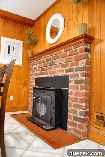 Before photo of the old, dated fireplace prior to renovation