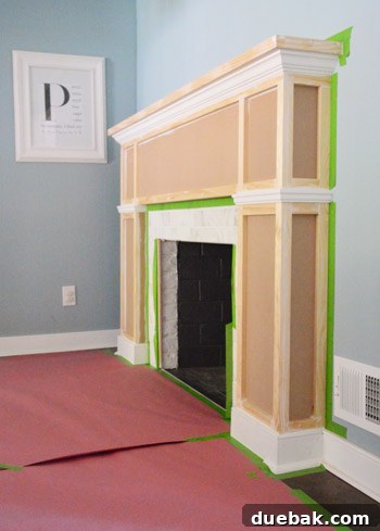 Our $200 Marble Fireplace Glow-Up 4 Close-up of the fireplace showing the newly built-out surround before painting
