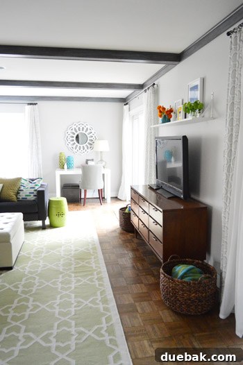 Elevate Your Entertainment Install a Shelf Above Your TV 12 Stylized shelf above TV with decorative items