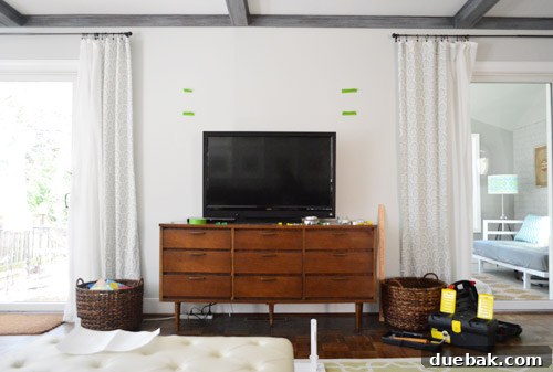 Elevate Your Entertainment Install a Shelf Above Your TV 5 New media cabinet installed with larger TV