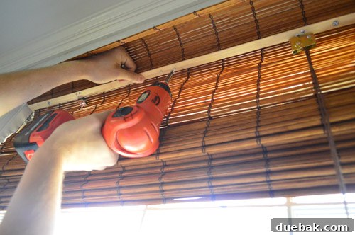 Office Oasis: Styling with Bamboo Window Treatments 4 Close-up of bamboo blind installation, showing screws