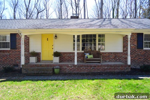 Refreshing Your Porch: Taking Down Scalloped Trim and Repairing Columns 2 Our home's front porch before the renovation, featuring dated scalloped trim and slender colonial columns.