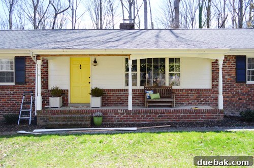 Refreshing Your Porch: Taking Down Scalloped Trim and Repairing Columns 7 The porch after the scalloped trim has been removed, showing the unfinished but cleaner structure.