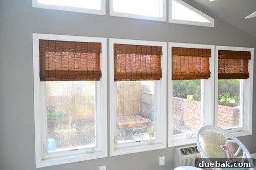 Sunroom interior showcasing the warmth of bamboo blinds