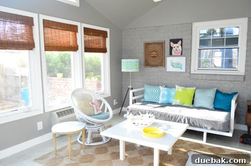 View from inside the sunroom with bamboo blinds drawn