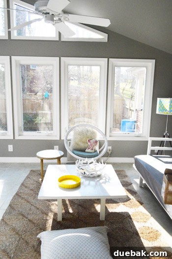 Before shot of the sunroom from the living room sliding door