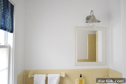 Partial view of the renovated guest bathroom with updated elements
