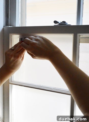 Frosted bathroom window allowing light but ensuring privacy