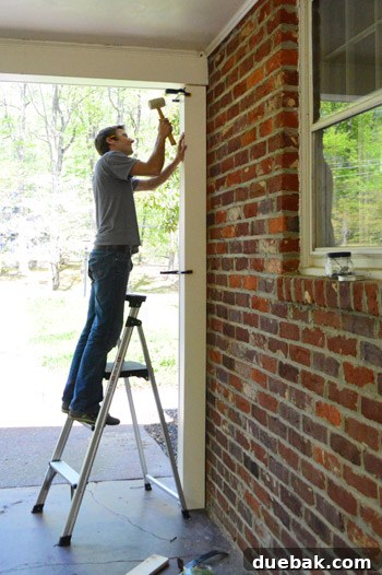 Designing and Preparing Your Carport Pergola 7 New column being installed on the house side of the carport