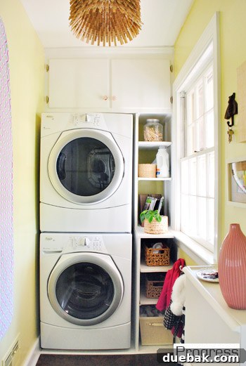 Laundry room with cork flooring and custom shelves