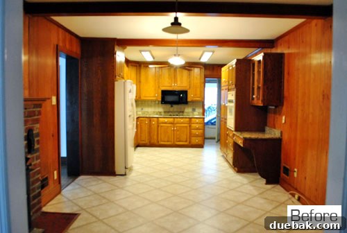 Kitchen with white cabinets and new countertops