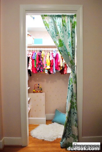 Stenciled walls inside Clara's closet