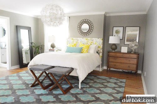 Another view of the master bedroom showing furniture arrangement