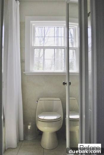 Master bathroom with high shower curtain and frosted window