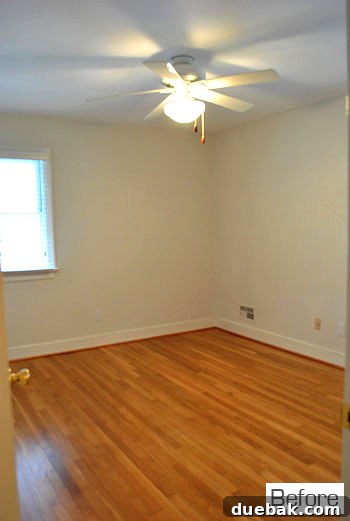 Inviting guest bedroom with dark accent wall