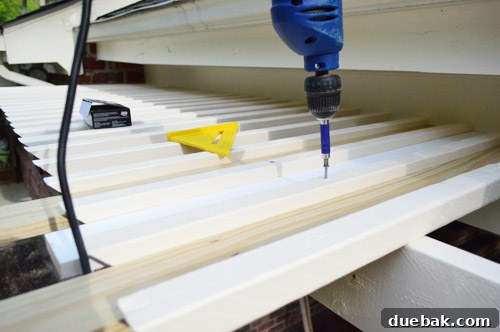 Using spacers to maintain even gaps while installing lath